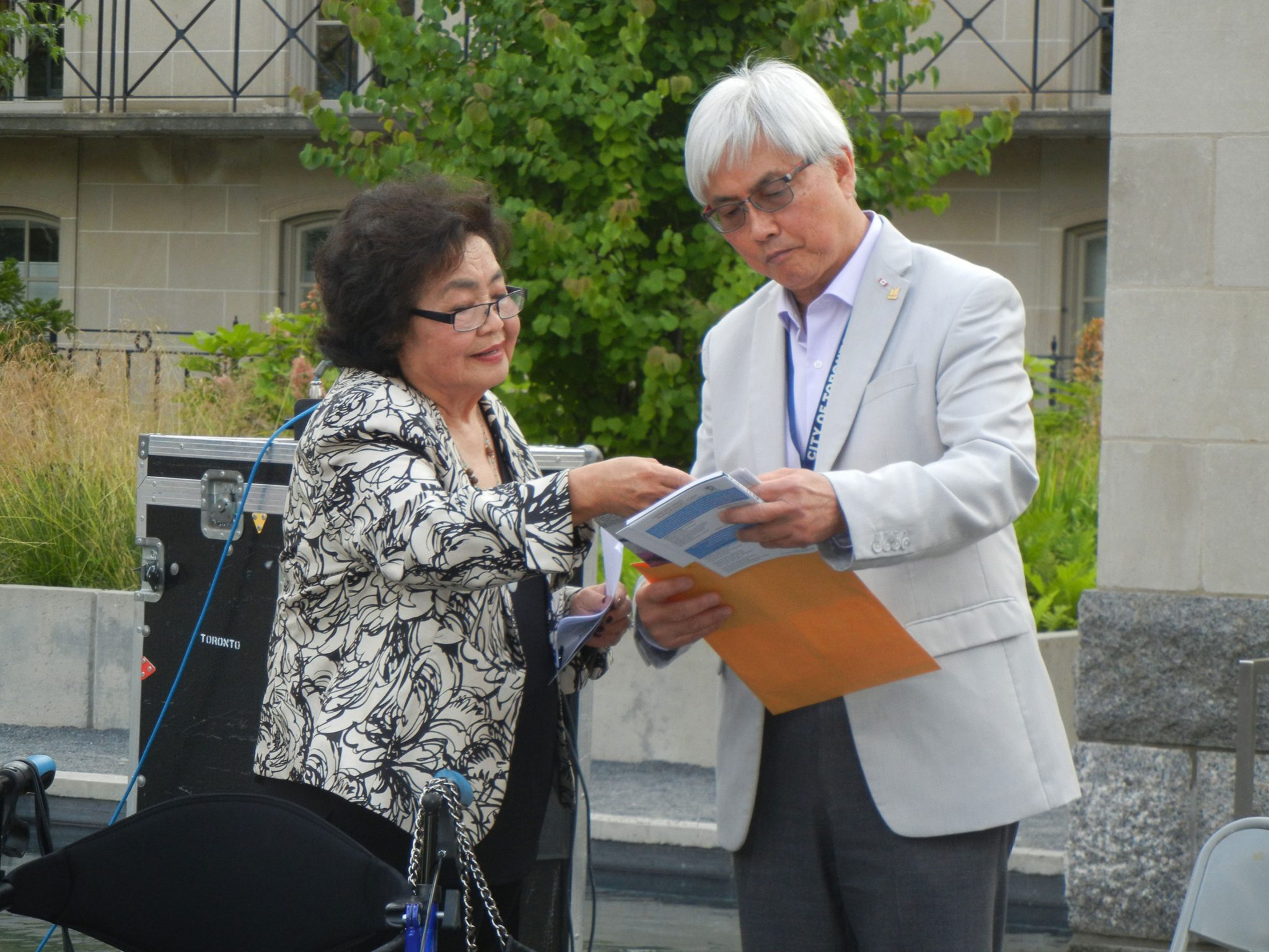 Setsuko Thurlow and Councillor Chin Lee at the Toronto City Hall Peace Garden. 